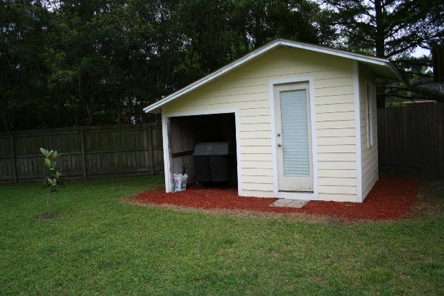 Riding lawn mower storage shed, outdoor wood shed plans